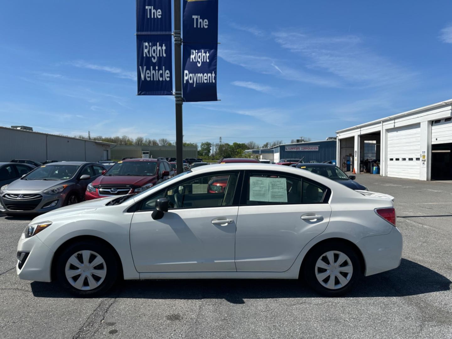 2016 WHITE Subaru Impreza 2.0i PZEV CVT 4-Door (JF1GJAA68GH) with an 2.0L H4 DOHC 16V engine, CVT transmission, located at 1254 Manheim Pike, Lancaster, PA, 17601, (717) 393-9133, 40.062870, -76.323273 - Photo#7